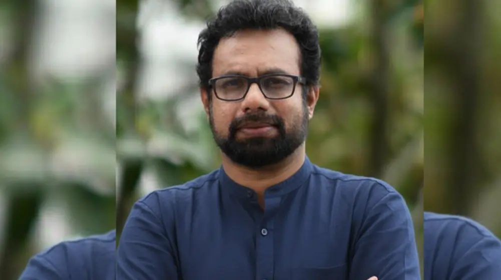 John Brittas opposes RSS Ganageetham at Christmas event